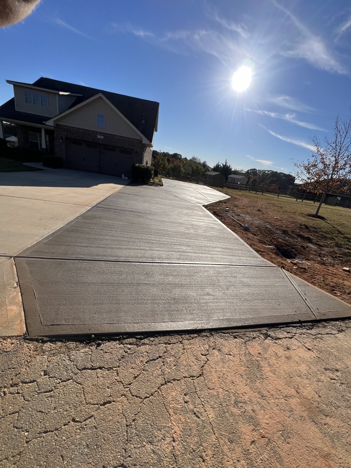Fresh residential concrete driveway extension