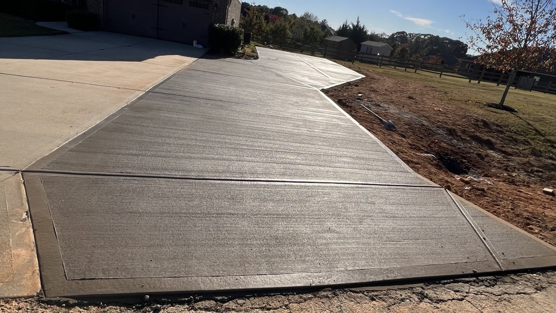 Completed concrete driveway by JCS